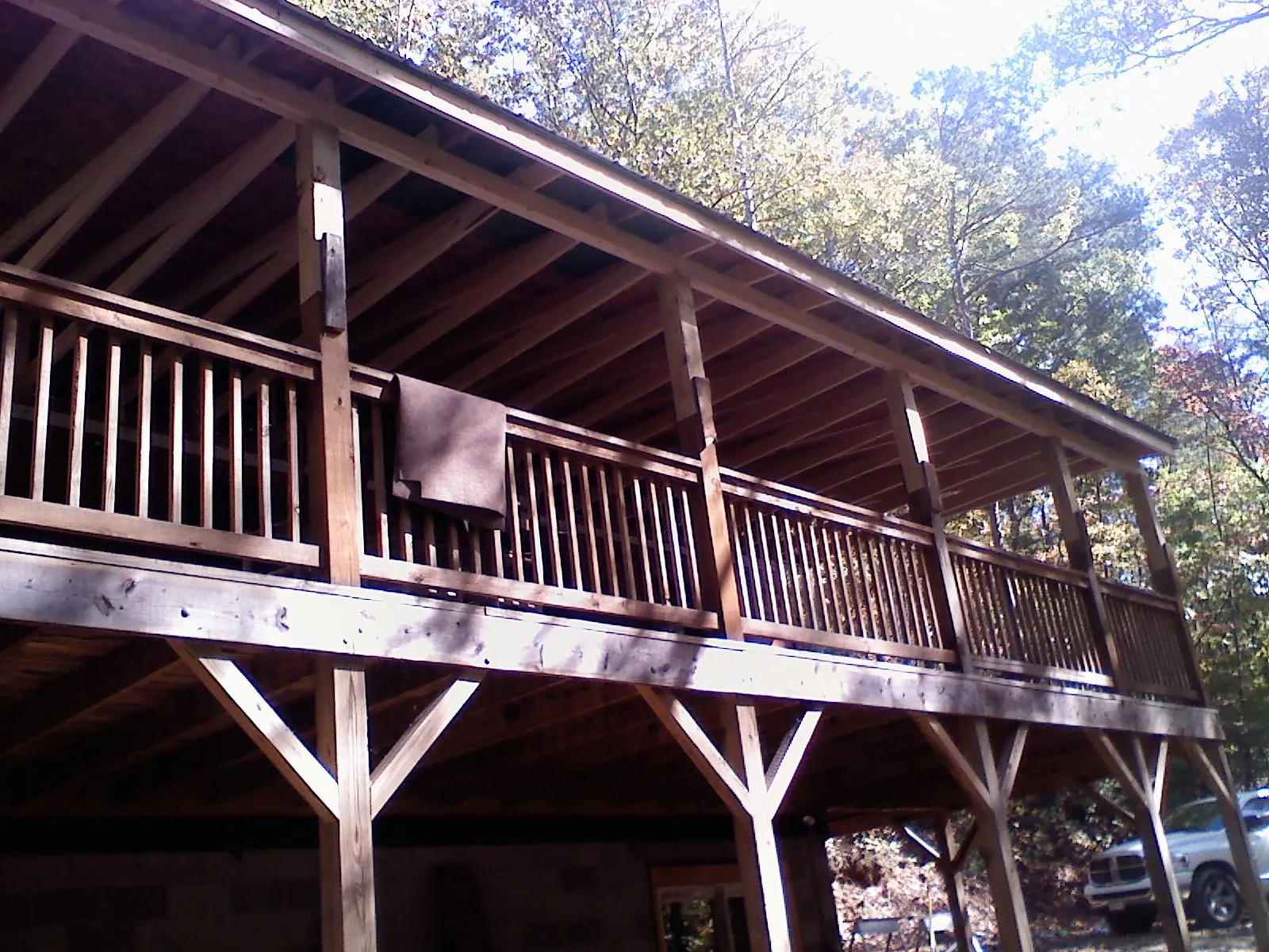 Timber framing under a new elevated porch and deck — Roof Leak Repair in Loysburg by Roofing Brothers